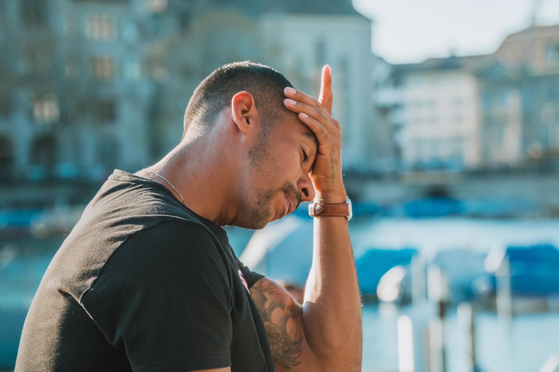 This image shows a worried boyfriend. It's used for the article, "my girlfriend is talking to another guy behind my back"