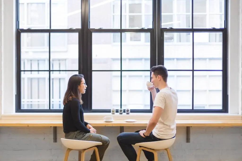 This image shows a couple talking. It's used for the article, "why is my girlfriend so annoying"