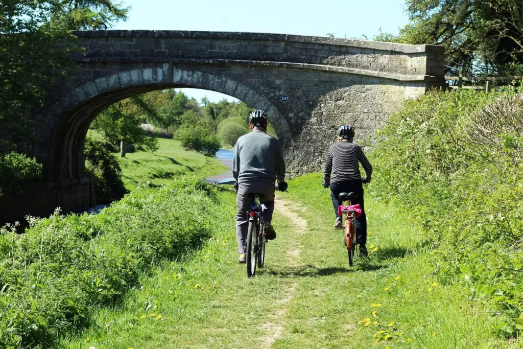 This image shows a couple cycling together. It's used for the article, "girlfriend gaining weight" 