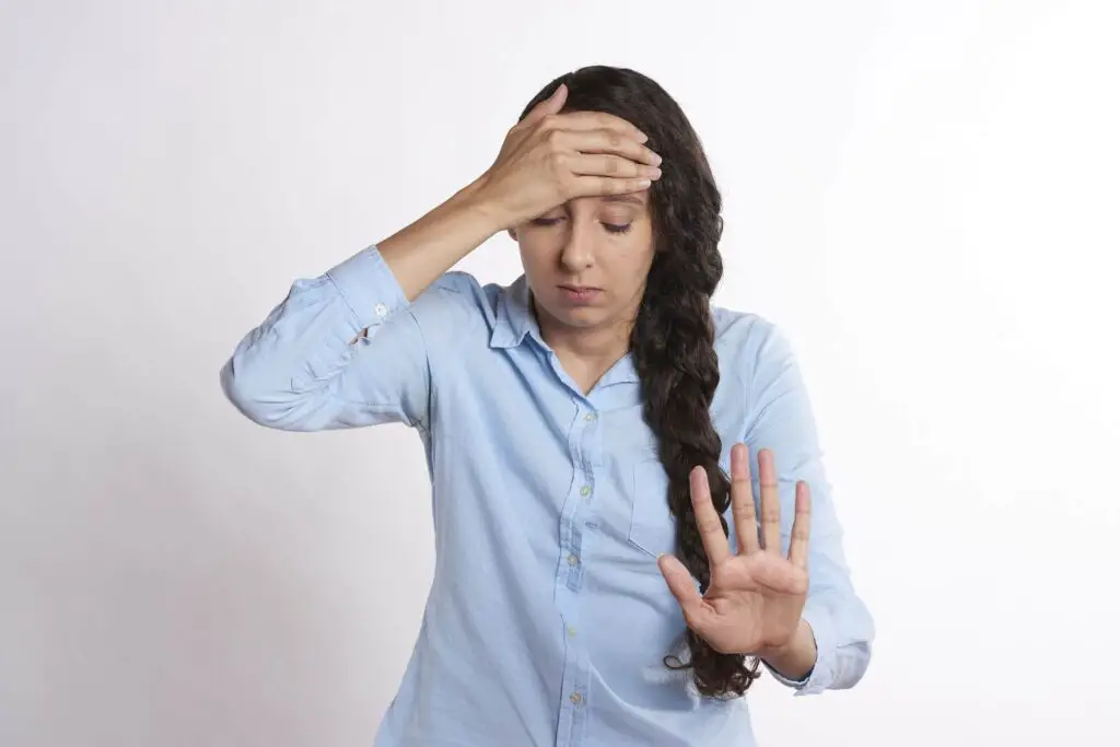 This image shows a worried woman. It's used for the article "My girlfriend won't tell her parents about me" 