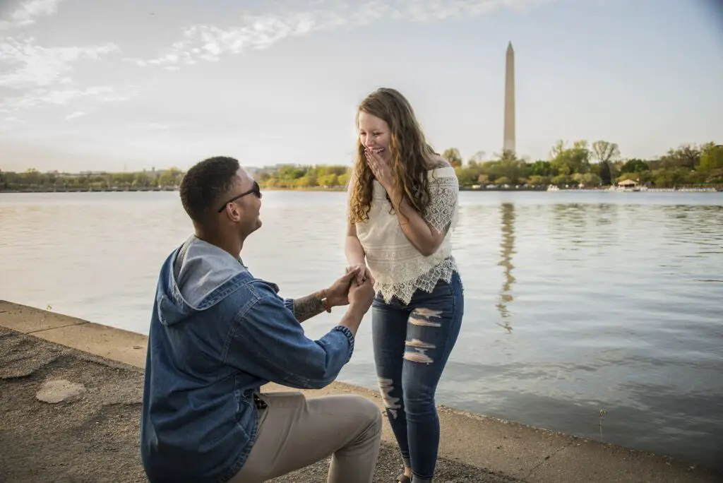 This image shows a man proposing. It's used for the article "boyfriend hasn't propoed after 5 years" 