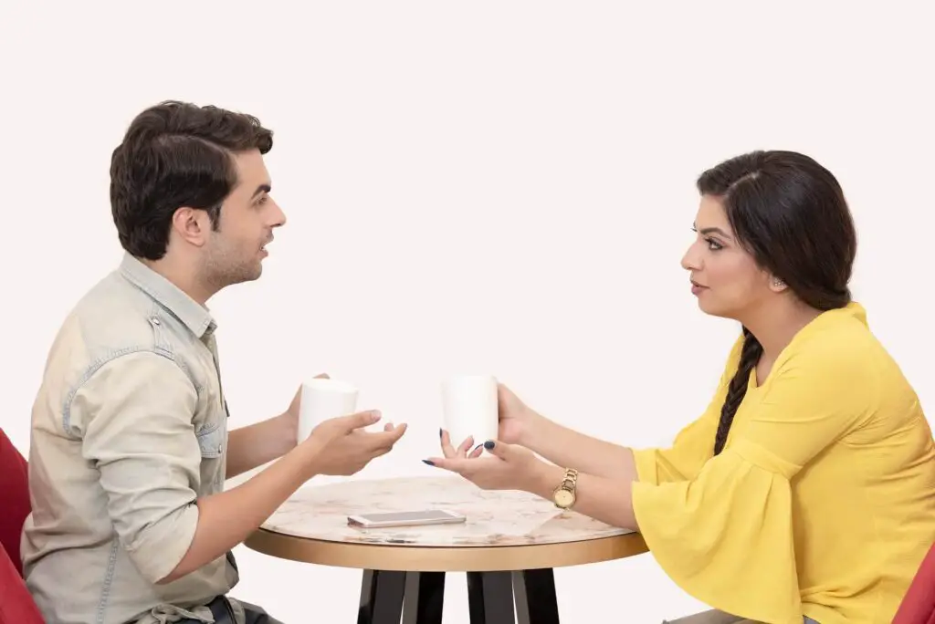 This image shows a couple in discussion. It's used for the article "My boyfriend is acting weird" 