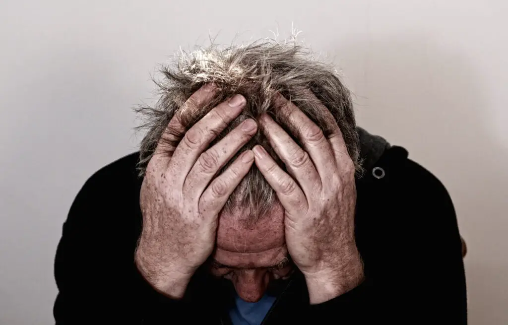 This image shows a man in distress. It's used for the article, "My boyfriend doesn't share his problems with me" 