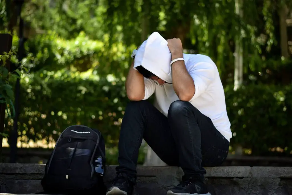 This image shows a man in distress. It's used for the article, My boyfriend hangs up on me when he's mad 