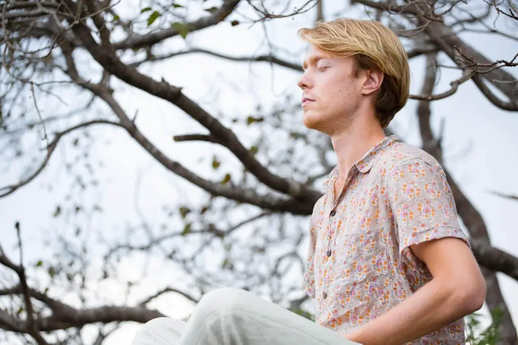 This image shows someone meditating.  It's used for the article "should I block someone who ghosted me?" 