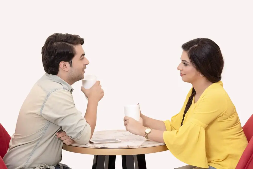 This image shows a couple dating. It's used for the article "should I block someone who ghosted me?"