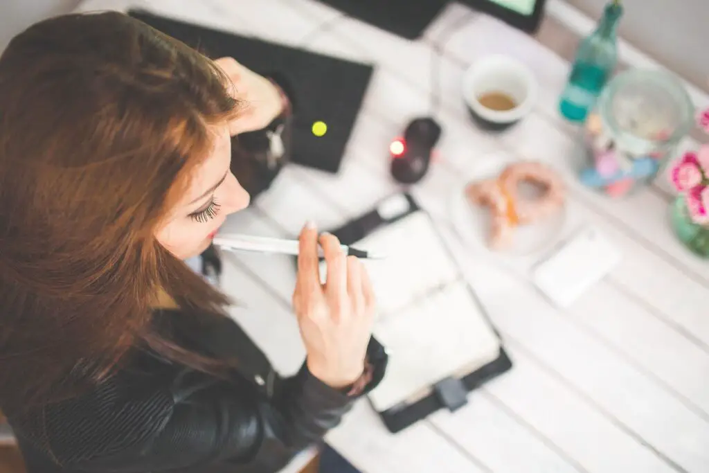 this image shows a woman reflecting. it's used for the article "how to less afraid of dating with intention"
